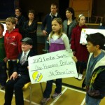 Kindergarten class kicks of day in Souris with cheque