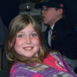 Luke looks on in the background!